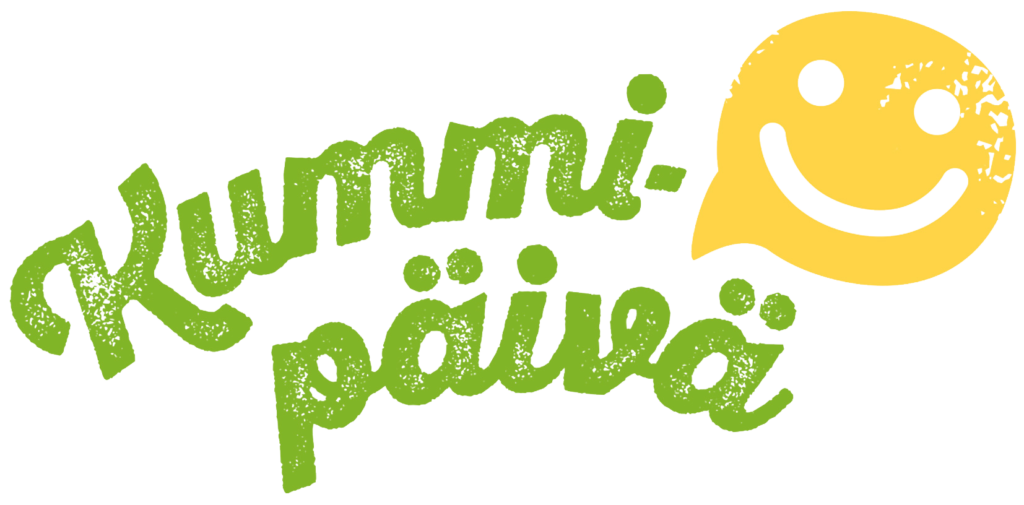 Kummipäivän tunnus, jossa hymyilevä naama